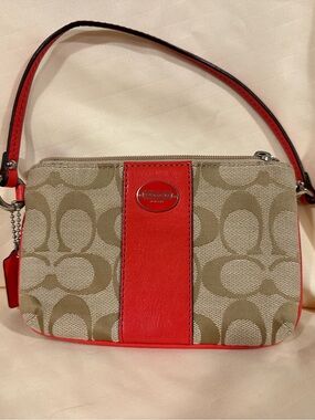 Coach Signature Canvas Wristlet with Coral Leather Trim